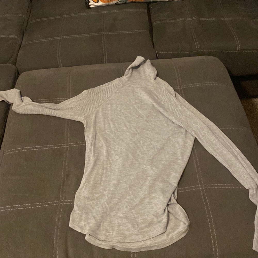 Gray sweater worn a lot but In good condition